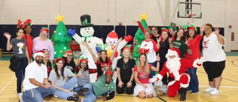 Christmas photo of group in gym