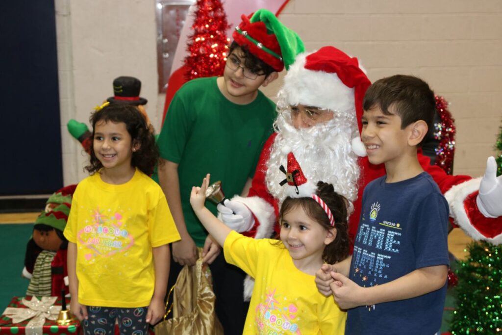 kids pose with Santa