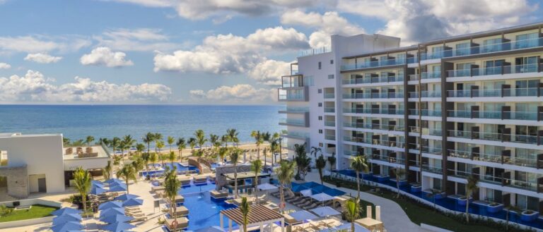 blue diamond resort exterior with pool and ocean view