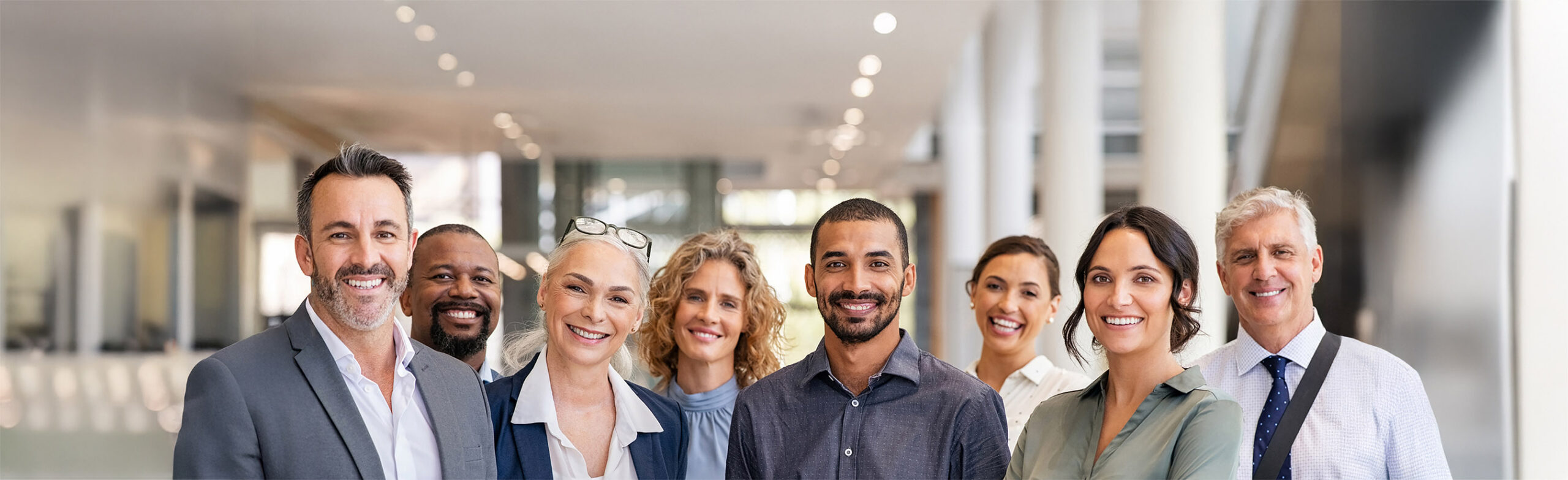 diverse group of business people smiling