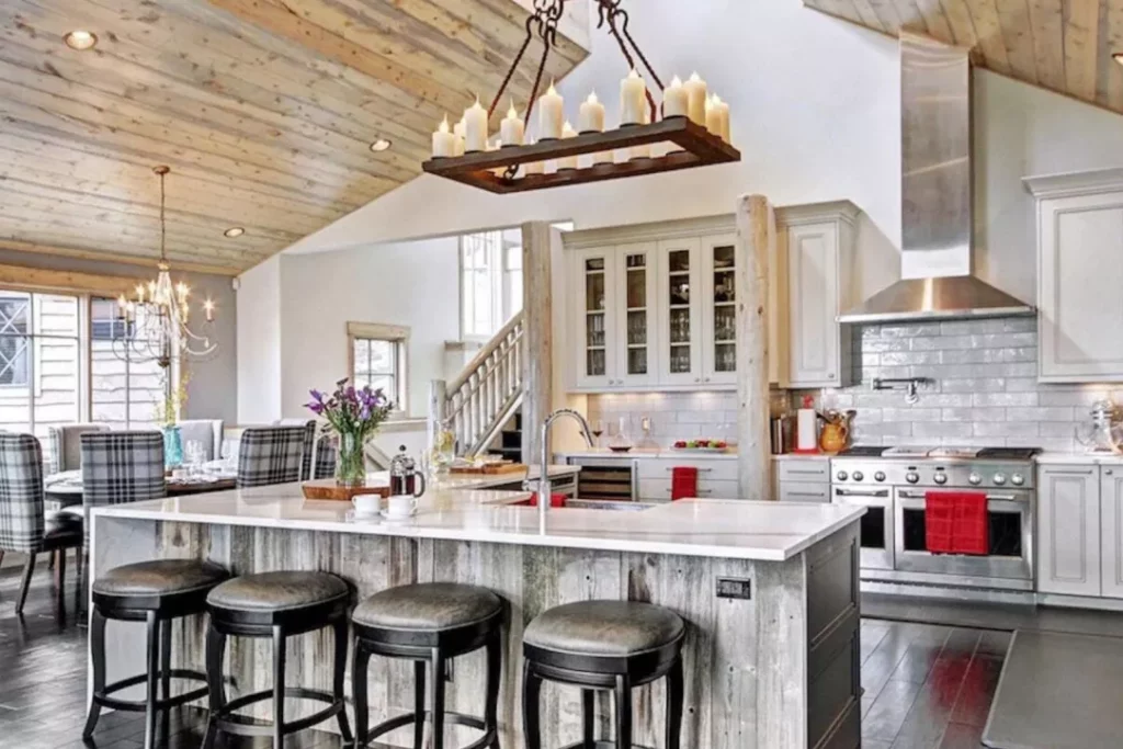 large open kitchen with vaulted ceilings and upscale tiles