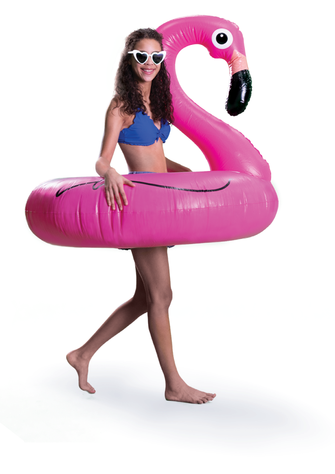 woman in swimsuit using an inflatable flamingo pool toy